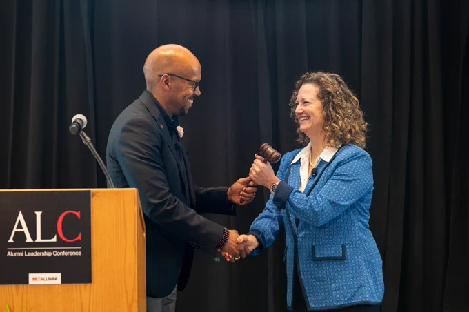 R. Robert Wickham ’93, SM ’95 passes the official gavel to new MITAA President Natalie Lorenz Anderson ’84