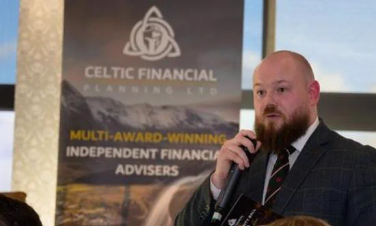 Man speaking with Celtic Financial Planning Ltd sign behind him / Dyn yn siarad gyda Celtic Financial Planning Ltd arwydd y tu ôl iddo 