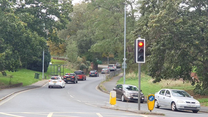 Photo of cars queuing up East Wonford Hill 