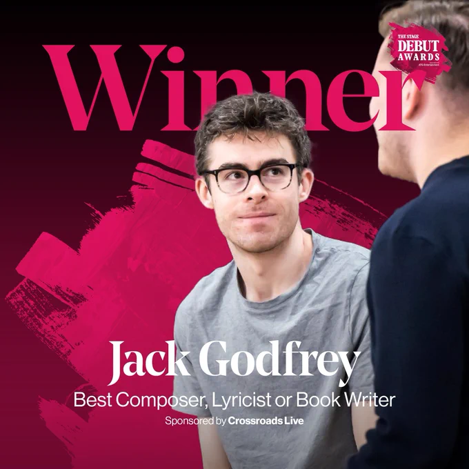 An asset with a black to pink gradient, with a pink paint splash on. There is large pink text that says 'Winner' with a cut-out image of Jack Godfrey. White text at the bottom of the asset says 'Jack Godfrey - Best Composer, Lyricist or Book Writer, sponsored by Crossroads Live'