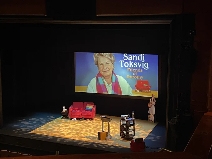 Stage with a background which reads Sandi Toksvig, Friends of Dorothy