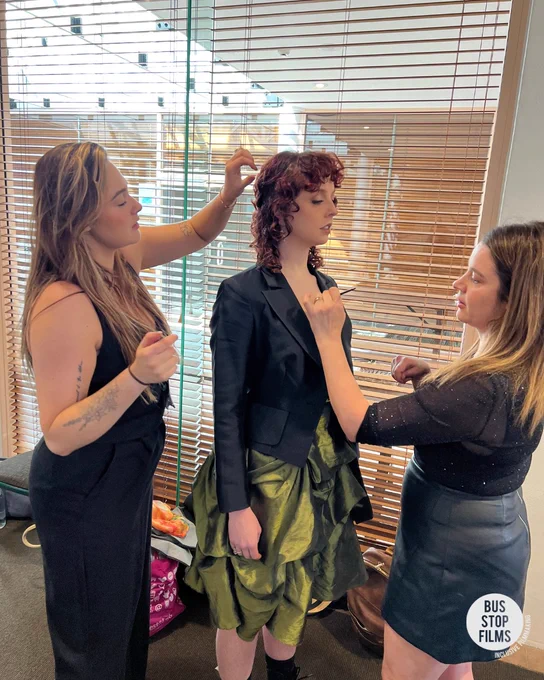 2 girls doing hair and makeup