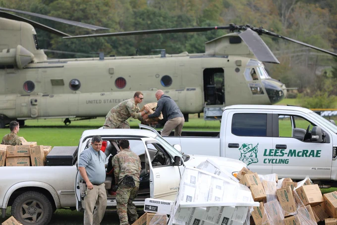 Soldiers assigned to the Connecticut, Maryland and North Carolina National Guard work together to distribute food and water to local first responders in Avery County on Sept 29, 2024. National Guard Aviation crews from Connecticut, Maryland, Pennsylvania and Iowa are supporting the NC Emergency Management and the NCNG in response to citizens affected by Helene. (U.S. Army National Guard photo by Sgt. 1st Class Leticia Samuels)