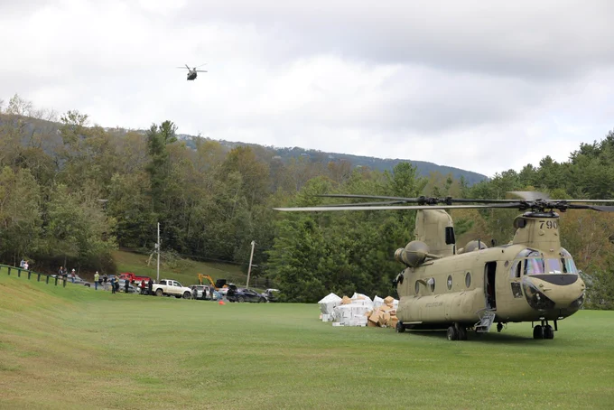 Soldiers assigned to the Connecticut, Maryland and North Carolina National Guard work together to distribute food and water to local first responders in Avery County on Sept 29, 2024. National Guard Aviation crews from Connecticut, Maryland, Pennsylvania and Iowa are supporting the NC Emergency Management and the NCNG in response to citizens affected by Helene. (U.S. Army National Guard photo by Sgt. 1st Class Leticia Samuels)