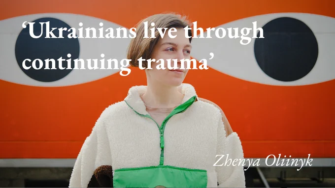 A portrait of the writer and artist Zhenya Oliinyk with a quote from her blog: 'Ukrainians live through continuing trauma'