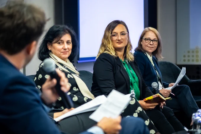 Julie (far right of image) take part in a panel.