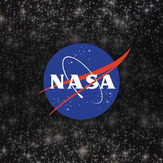 The round blue insignia of NASA, aka "the meatball," appears on a glittering star field. Credit: NASA