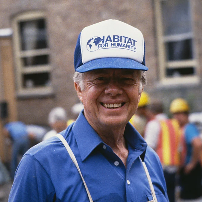 Former United States President Jimmy Carter on a Habitat for Humanity build site. 