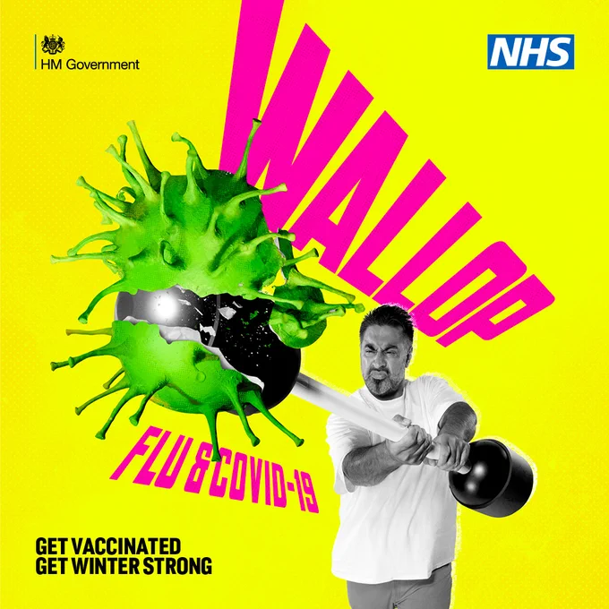 Man in a white t-shirt hits a virus with a pugil stick