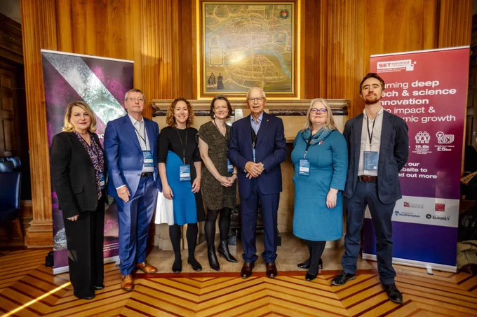 A group of government representatives, investors, university innovation leaders and industry standing at an Economic Summit event in Bristol on 11 October 2024. 