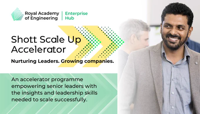 Person smiling at a Royal Academy of Engineering Enterprise Hub event titled 'Shott Scale Up Accelerator', which focuses on nurturing leaders and growing companies.