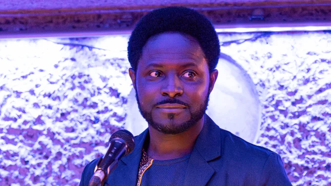 Freddie Opoku-Addaie delivering a speech