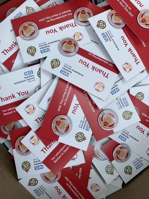 Pile of thank you badges