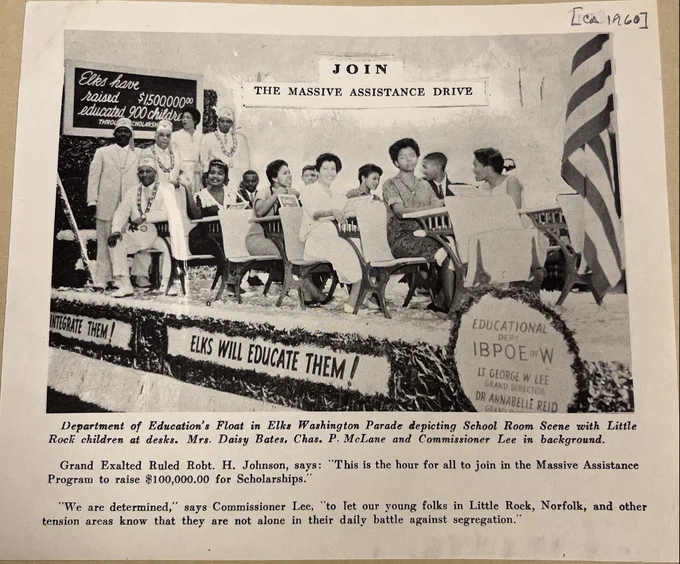 A historic advert or newspaper entry showing a float promoting the department of education in Elks, Washington and their fundraising drive.