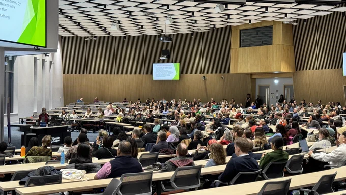 Audience in a large lecture theatre as Patricia Hill Collins delivers her lecture 