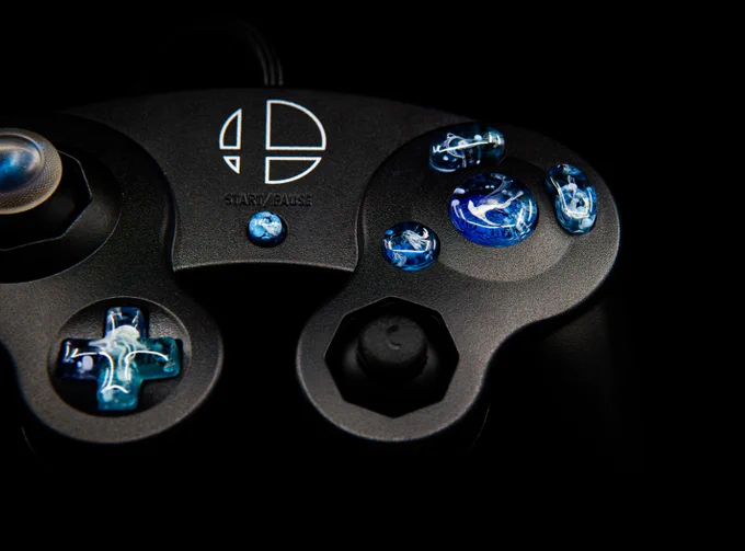 super cool smash ultimate gamecube controller with blue buttons, black c stick, and a galaxy xbox inspired primary stick