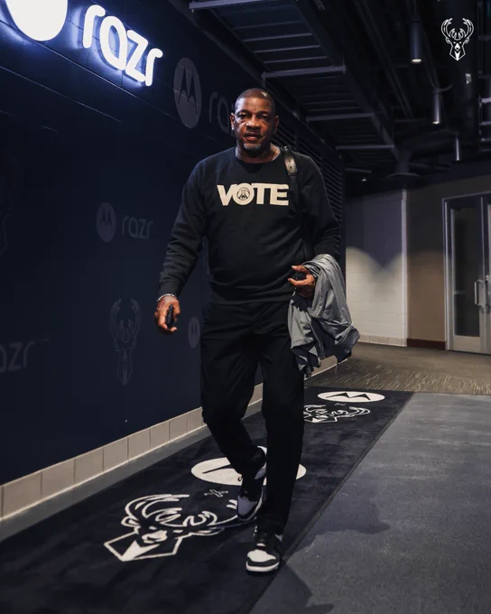 A photo of Doc Rivers walking into Fiserv Forum.