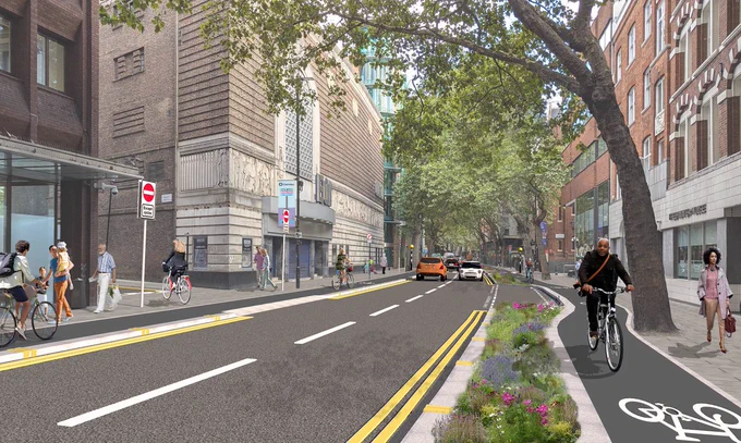 Visualisation of Charing Cross Road with man cycling in a cycle lane separated from the traffic by planting