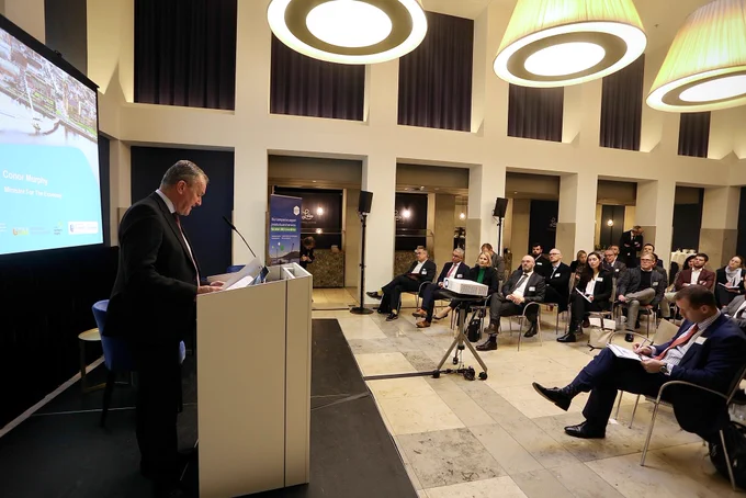 Economy Minister Conor Murphy addresses attendees at a business roundtable in Berlin.