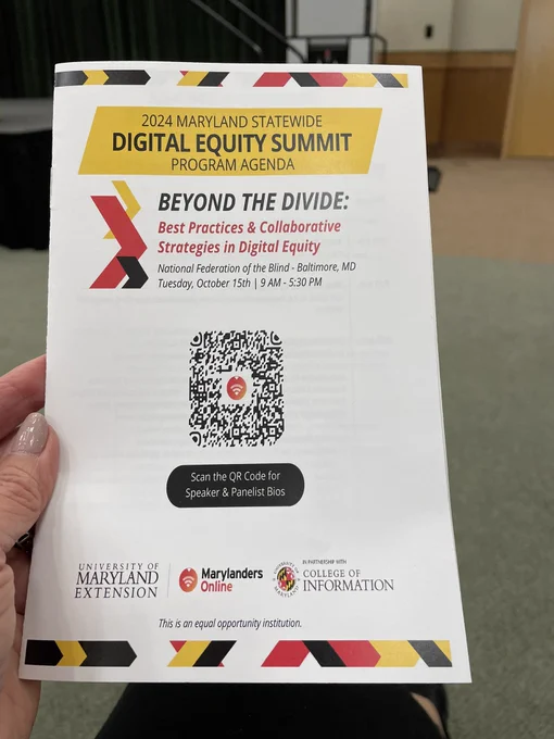 A conference brochure introducing Beyond the Divide about digital equity. White background with red gold and black logo red and black letters.