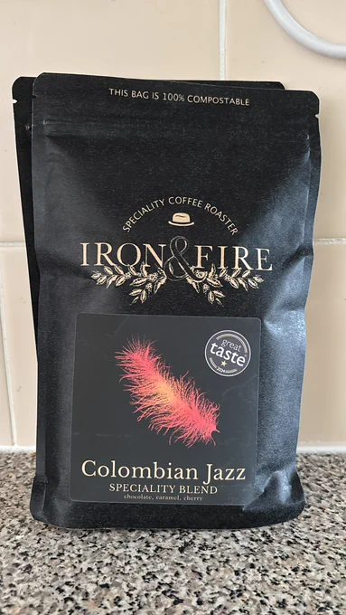 A bag of roastery Iron & Fire colombian jazz coffee beans