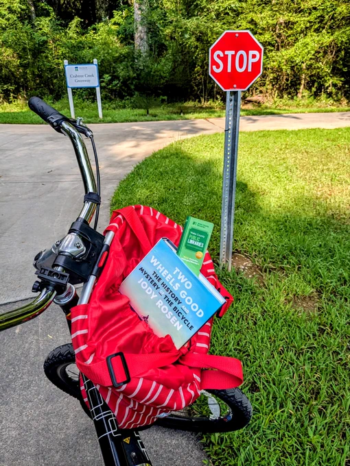 A library card in a bike basket