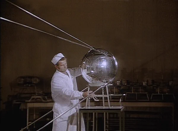 This still from a film made post-Sputnik, gives a good sense of the size of the actual satellite. (credit: Don Mitchell)