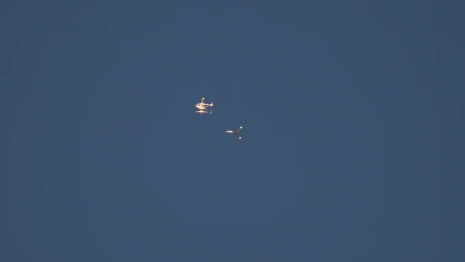 White Knight carrier plane with SpaceShipOne followed by Beechcraft Starship chase plane as they climb to altitude above Mojave to air-launch SpaceShipOne for its X-Prize space flight attempt on October 4, 2004

photo by Ian Kluft