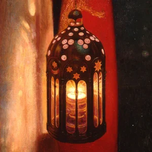 Intricately detailed black lantern with candle