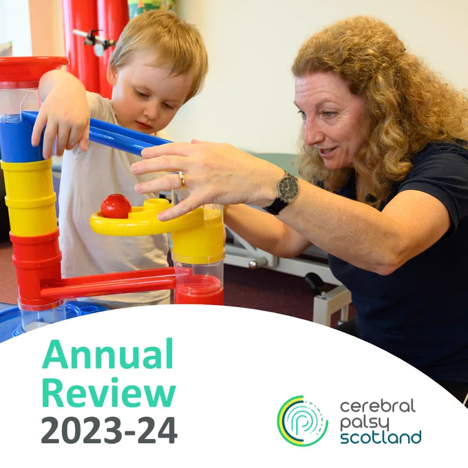 Photo of a therapist playing a marble run game with a young child. Text reads: Annual Review 2023-24. Cerebral Palsy Scotland. 