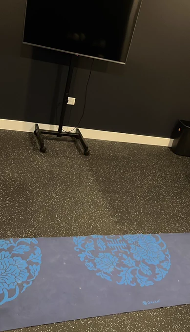 Yoga mat   tv on a rolling stand