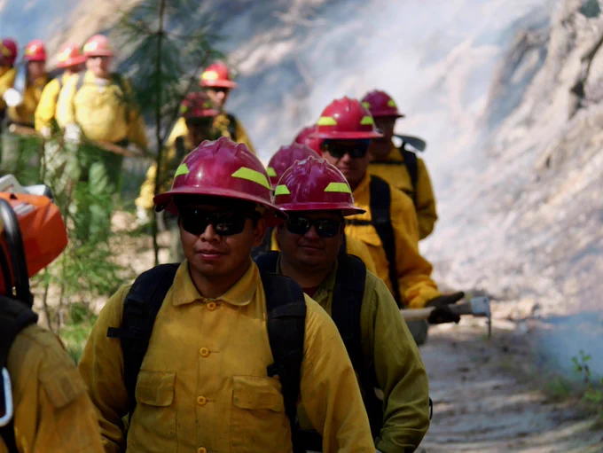 "Type 2" hand crews are a critical piece of the effort! Though they do not get as much notice as the more highly experienced "hotshot" crews, type 2 hand crews do a lot of hard work - brushing out roads and fire lines, mopping up, stringing hose. And, at this time of year when hotshot crews are scarce, it would be near impossible to contain fires without them. This crew is from the company Alta Pacific out of California.
