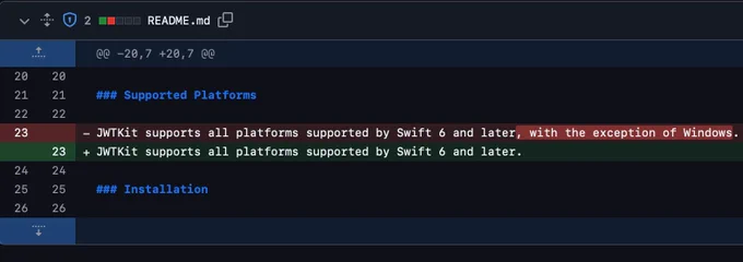 A screen capture of a code editor displaying a diff of a Markdown file named "README.md." The highlighted lines show a modification in the text regarding the supported platforms for JWTKit, changing from mentioning Windows is not supported to removing that statement.