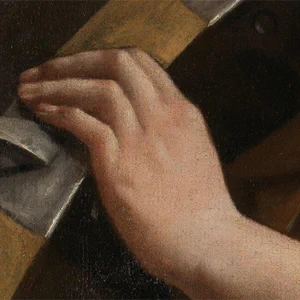 Close up of a hand holding an object