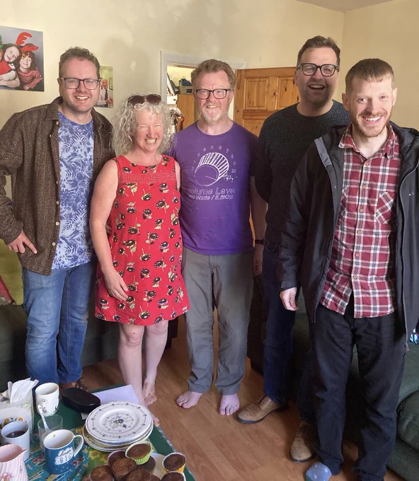 Three band members with Angela and Martin