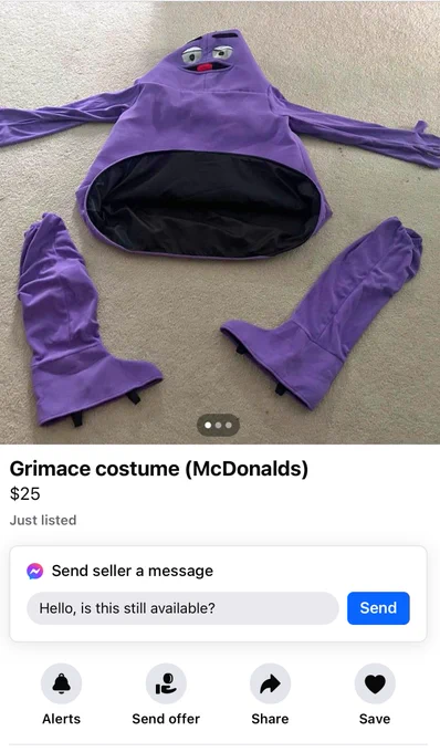 A sad looking Grimace costume laying on the ground for sale for $25 on Facebook marketplace