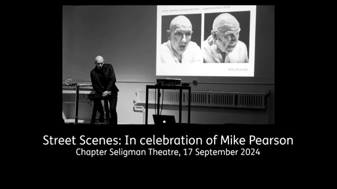 Black image featuring black and white photograph of Mike Pearson presenting in front of a slideshow.  Text reads: Street Scenes: In Celebration of Mike Pearson. Chapter Seligman Theatre, 17 September 2024