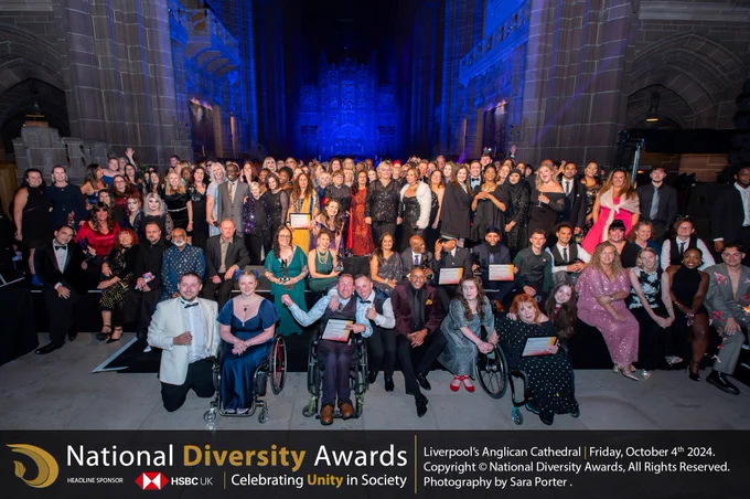 Huge photo of all the shortlists on stage at the National Diversity Awards