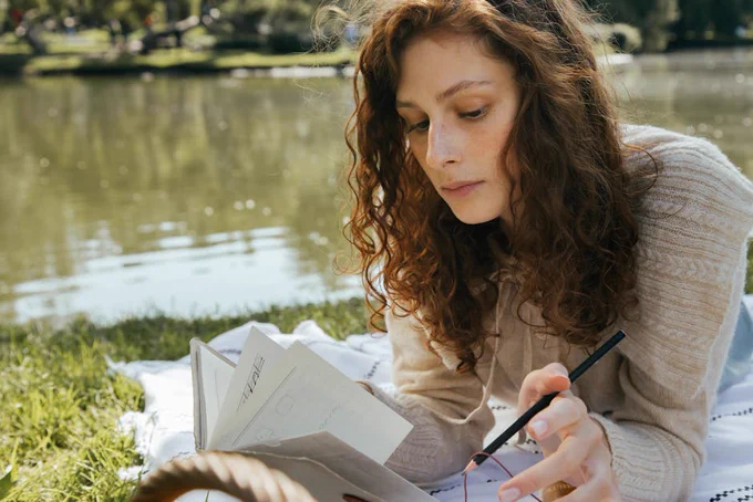 Woman Writing in Journal 