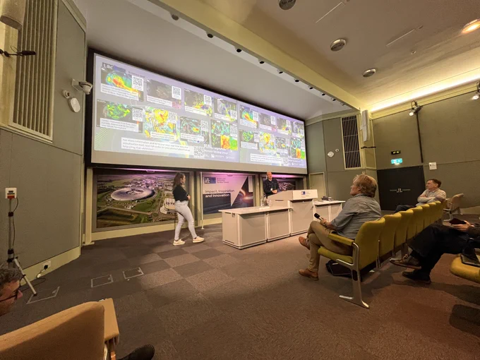 Session lead thanks a speaker as they conclude their talk in a lecture theatre