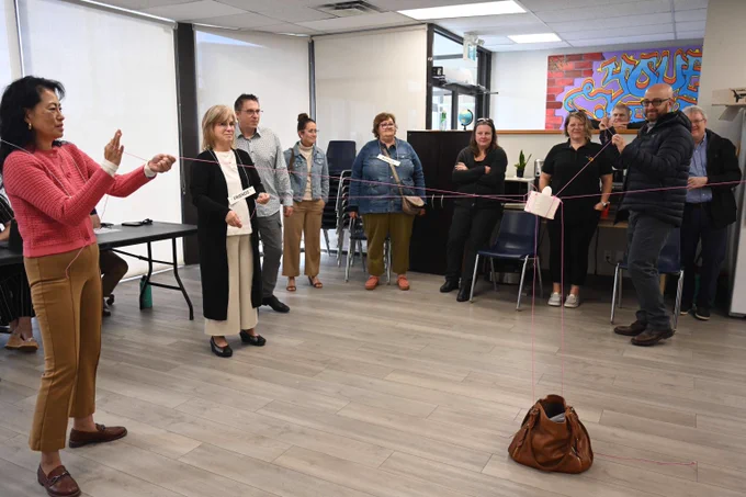 Staff participating in an activity at Youth Diversion.