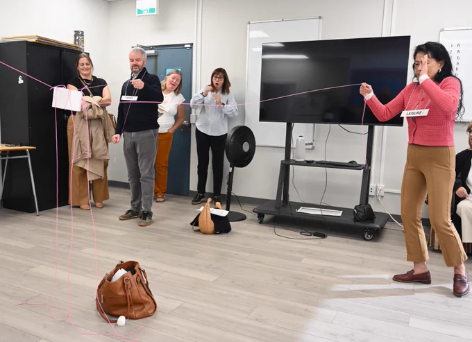 Staff participating in an activity at Youth Diversion.