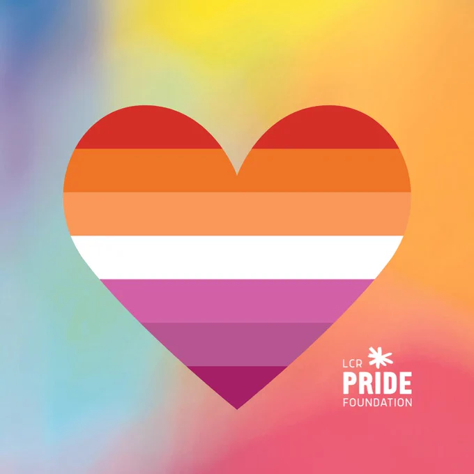 A heart symbol featuring the colours of the lesbian flag placed on a multicoloured background.