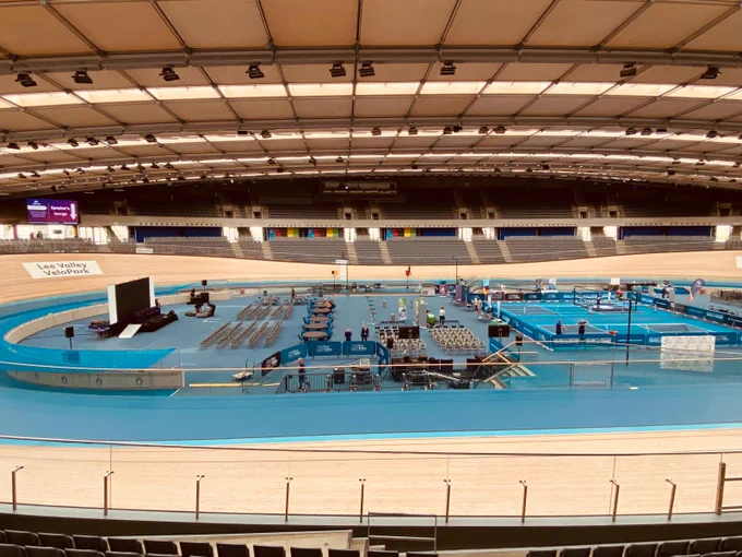 Image of the summit, before guests arrive, at the centre of the Velodrome track, with a stage and seating