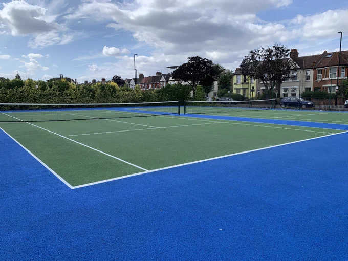 A pic of the resurfaced full-size tennis courts at Chapmans Green.