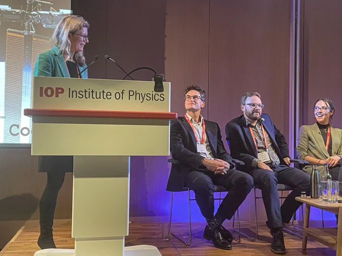 Image of moderator Dr Joanna Hart talking to the panel, pictured Nick Shave Managing Director at Astroscale, Andrew Bacon co-founder and CTO of Space Forge and Katie King CEO of BioOrbit.