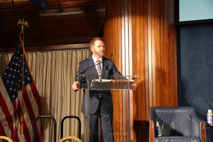 Tom Thompson speaks at the event