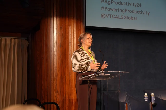 Jessica Agnew speaks on stage