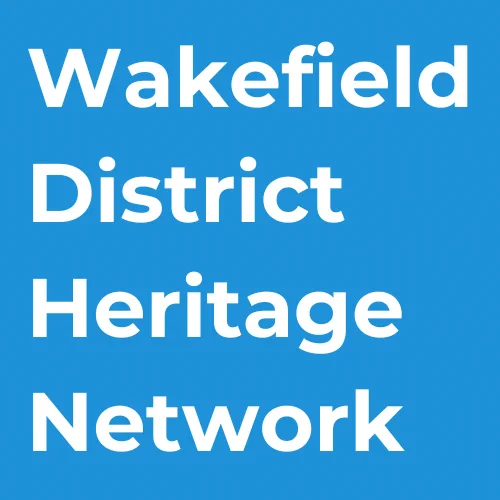 A blue background with white words saying Wakefield District Heritage Network
