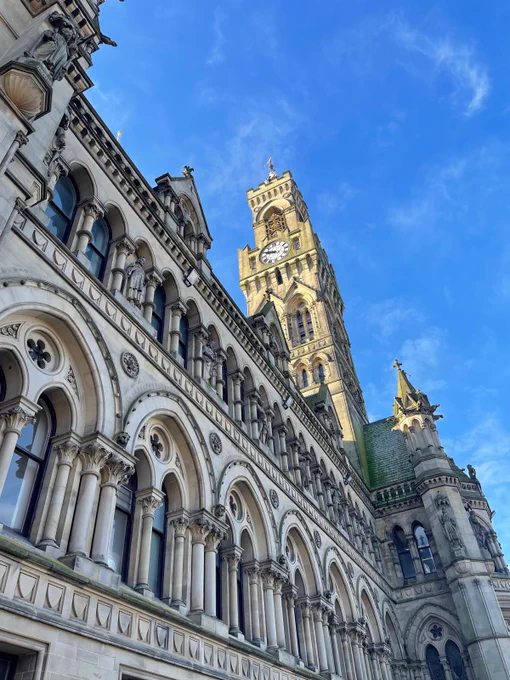 A photograph of a historic building with a clock tower.